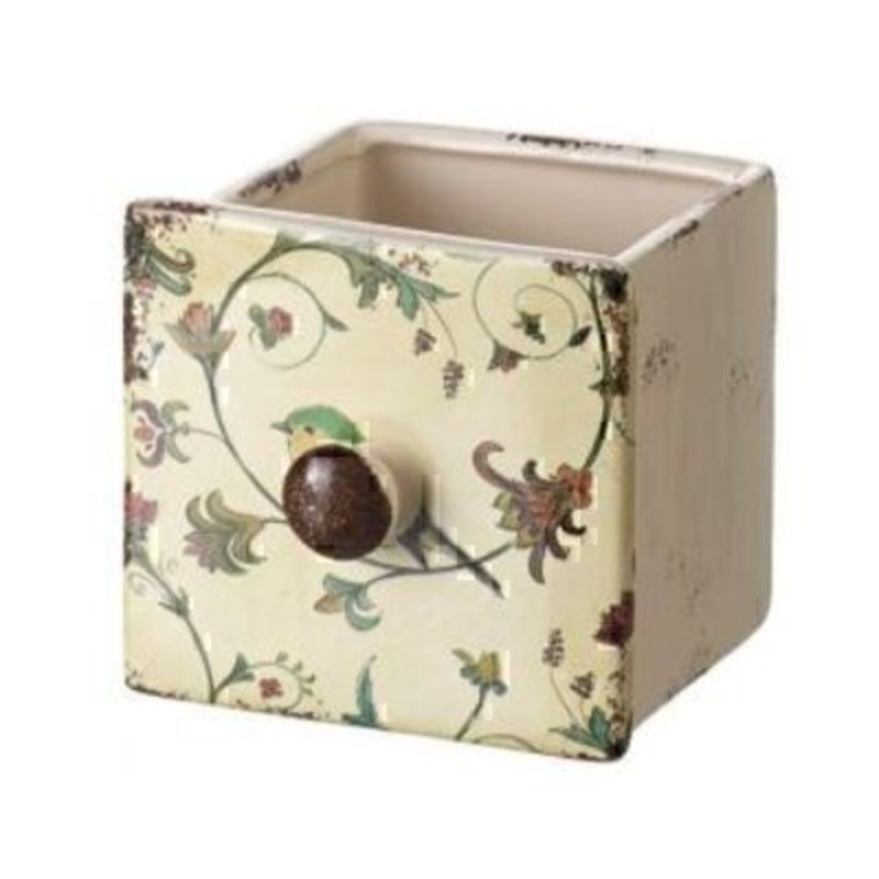 This Medium Sized Vintage Ceramic Pot in a Drawer Style by Heaven Sends is a quirky choice of pot for your home. In the style of a drawer it features a drawer knob and a bird and leaf pattern on the front. This vintage style pot in the shape of a drawer i
